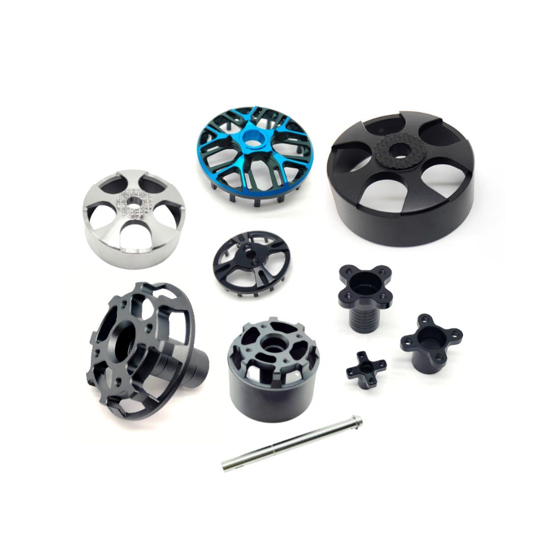 Full set of CNC aluminum motor parts for drones, including rotor housings, stator bases, shafts, and mounts.