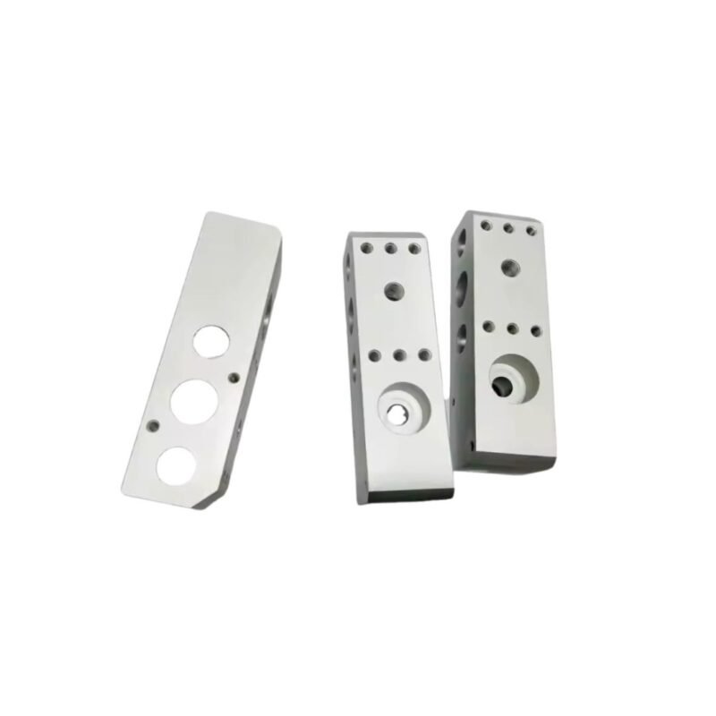 CNC-machined aluminum housing part for transistor-based automotive and motorcycle electronics.